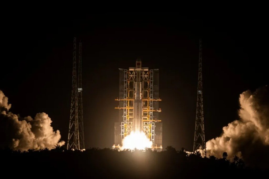 A Long March 7A rocket lifts off at night from China